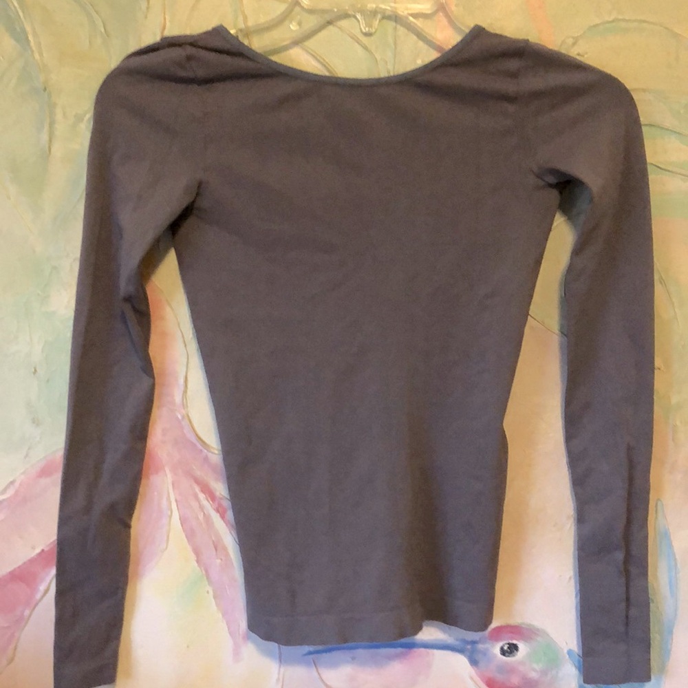 NUX  Long Sleeve open back top size S/M NWOT
